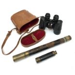 A Victorian brass and leather bound single draw telescope, a brass and ebonised pocket telescope and