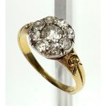A gold ring set a diamond cluster.Condition report: Cluster dia 10mm. 18 ct hallmarked very