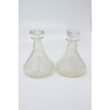 A pair of step cut circular ship's decanters, early 20th century. (Dimensions: Height 23cm.)(