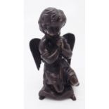 A bronze figure of a praying cherub. (Dimensions: Height 17.5cm.)(Height 17.5cm.)