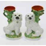 A pair of Victorian Staffordshire flat back spaniel spill vases. (Dimensions: Height 33cm.)(Height