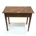 A walnut side table, circa 1900, with two frieze drawers on square tapering legs. (Dimensions:
