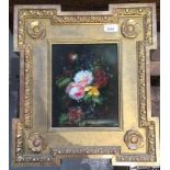 In the manner of Jan van HUYSUM Still life of flowers Oil on panel, in a stylised carved giltwood