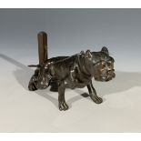 An early 20th century bronze model of a bulldog chained to a post. (Dimensions: Height 7.5cm.)(