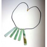 A Jade necklace. (Qty: 1)