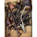 Miscellaneous pipes to include examples with carved treen bowls, one set with three miniature dice.