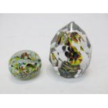 Two coloured glass paperweights. (Dimensions: Largest height 12cm.)(Largest height 12cm.)