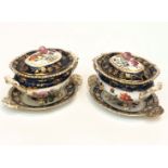 A pair of Coalport tureens with covers and stands, circa 1820, in the style of the Union Service. (