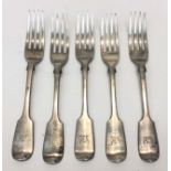 A set of five fiddle pattern early Victorian silver dessert spoons each engraved with a winged