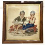 A 19th century wool work embroidery depicting two boys, together with a woolwork panel embroidered