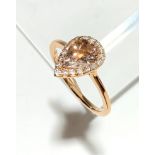 An 18ct rose gold, morganite and diamond ring, morganite length 8.5mm, widest 5.8mm, size M. (Qty: