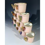 A Royal Worcester coffee service, circa 1875, comprising 15 coffee cans, each with hand painted
