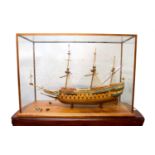 A scale model of the triple masted Swedish warship Vasa, 1628, well detailed in wood and with gilt