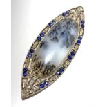 A fine French 18ct white gold eliptical moss agate brooch with diamond and sapphire border. (Qty: