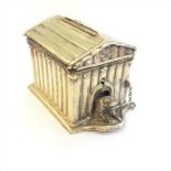 A French later 19th century silver plated dog and kennel money box, lacks key.