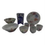 Four 18th century Chinese famille rose coffee cans, a tea bowl, a plate, a Japanese blue and white