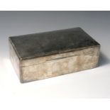A plain silver cigarette box