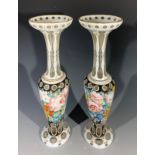 A pair of Victorian Bohemian glass vases with floral decoration. (Dimensions: Height 37cm.)(Height