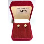A pair of diamond stud earrings, each with a single stone exceeding 1ct, set in 18ct yellow gold,