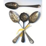 A pair of Victorian silver fruit spoons and matching sugar sifting spoon by William Hutton & Sons