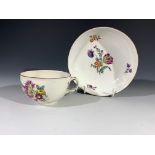 An 18th century Frankenthal teacup and saucer painted with floral sprays.Condition report: See