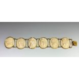 A gold mounted cameo bracelet the six ivory panels carved in relief with subjects from the