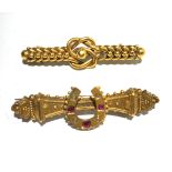 A 15ct horse shoe gold bar brooch, mounted with rubies and diamonds and a 9ct knot bar brooch.