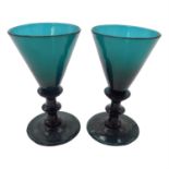 Two Georgian green glass wine glasses. (Dimensions: Height 12cm.)(Height 12cm.)Condition report: