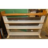 A four shelf open bookcase, 138cm long, 94cm high