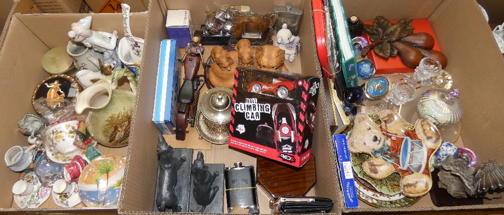 Three boxes of miscellaneous items including figurines, paperweights, candlesticks, photo frames etc