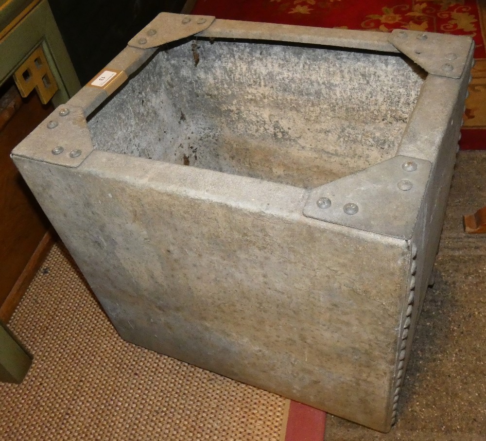 A galvanized metal container