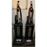 A pair of Sebo upright vacuum cleaners x/series