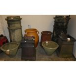 A pair of chimney pots, 83cm tall, together with a pair of small chimney pots and planters (8)