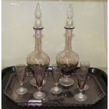 A French amethyst and clear glass liqueur set (8)