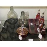 A continental six piece dressing table set together with a pair of slightly smoked glass carafes,