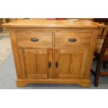 A modern oak sideboard, 101 cm long x 82 cm high x 48 cm deep