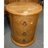 An unusual circular three drawer chest of drawers, 56 cm tall x 45 cm diameter