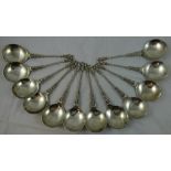 A set of twelve continental silver spoons, probably Hanau, circa 1890, D, IW, cross hatch, the