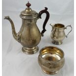 A silver three piece coffee service, by Adie Brothers, Birmingham 1957, of baluster form with a