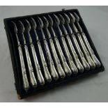 A French silver set of twelve pastry forks, bearing French control marks to the tings and handles.