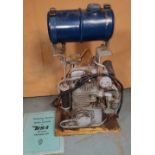 A BSA 300 watt battery charging engine, model 2-B-12, service number 5067829, together with an