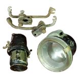 A King of the Road acetylene motorcycle lamp, with separate carbide container and a pair of