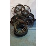 A quantity of mainly vintage and veteran wheels, some beaded edge.