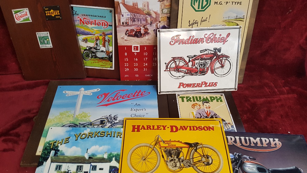 Various reproduction metal signs, some mounted.