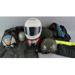 Various motorcycle wet weather gear, a Stadium Project K helmet with 1970's stickers, an Everoak "