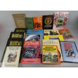 The Ultimate Motorcycle Encyclopedia by Brown & McDiarmid, together with other motorcycle books.