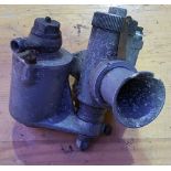 An Amal GP carb and float chamber, stamped 10 TT 9, J12I.