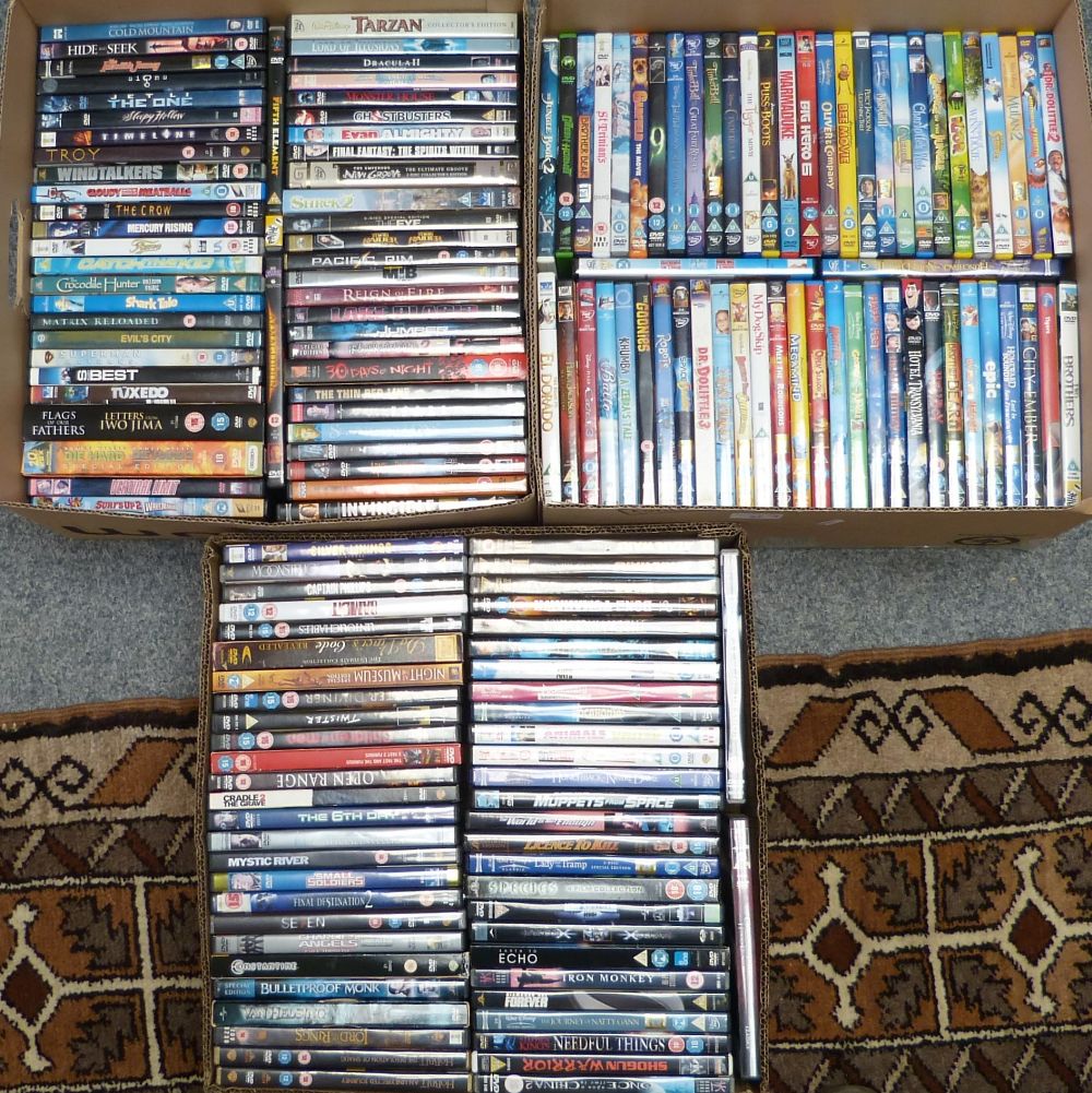 Three boxes of DVDs