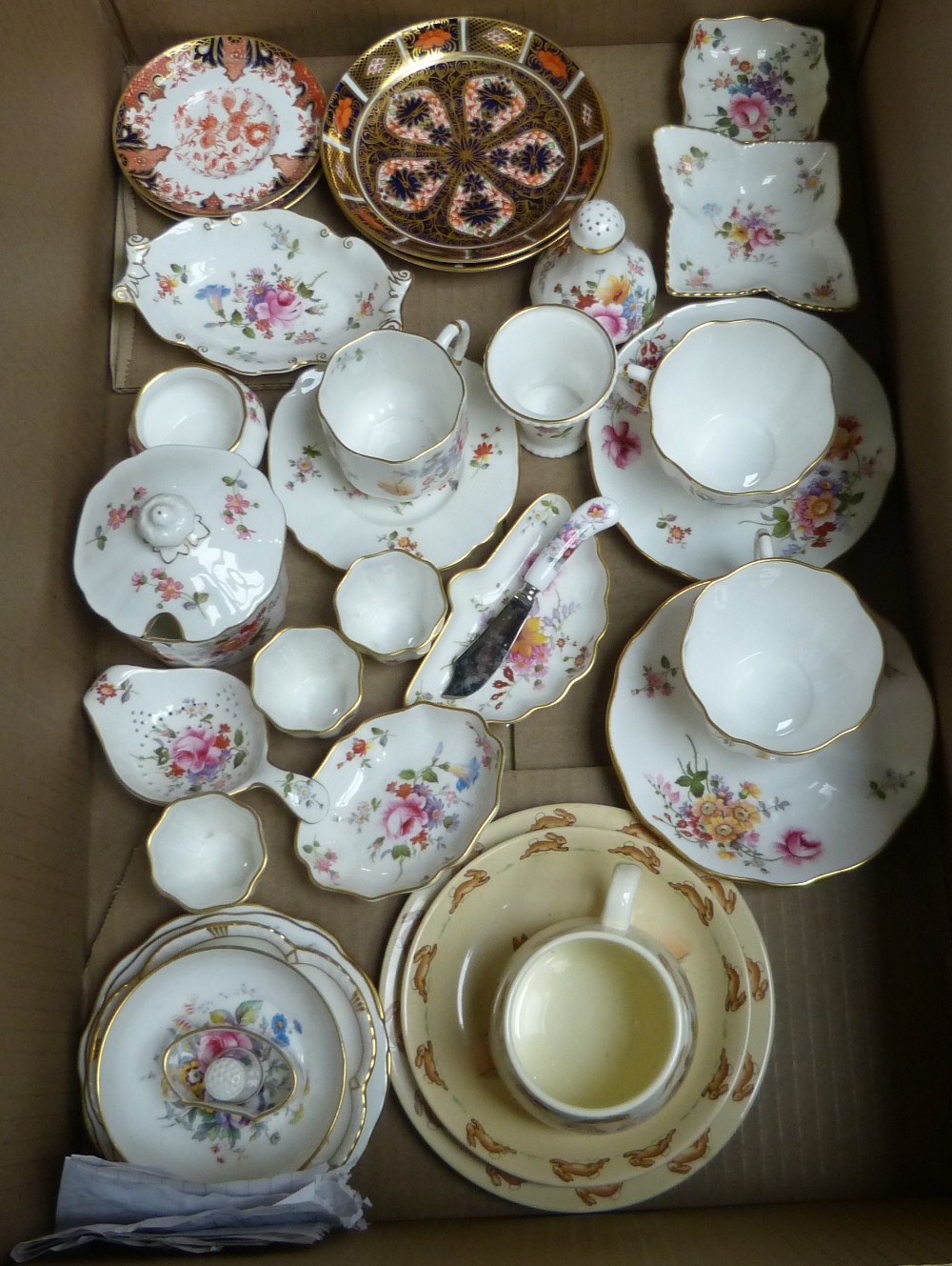 A box of Nano Royal Crown Derby, cups and saucers, together with Royal Doulton mannequins