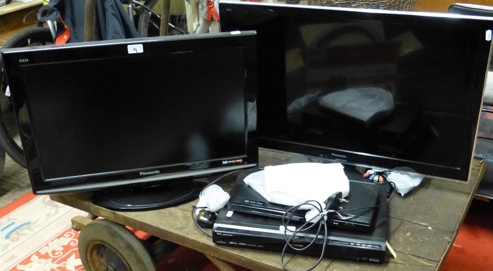 A Panasonic 32" colour TV together with a Panasonic 26" TV and two DVD players (4)